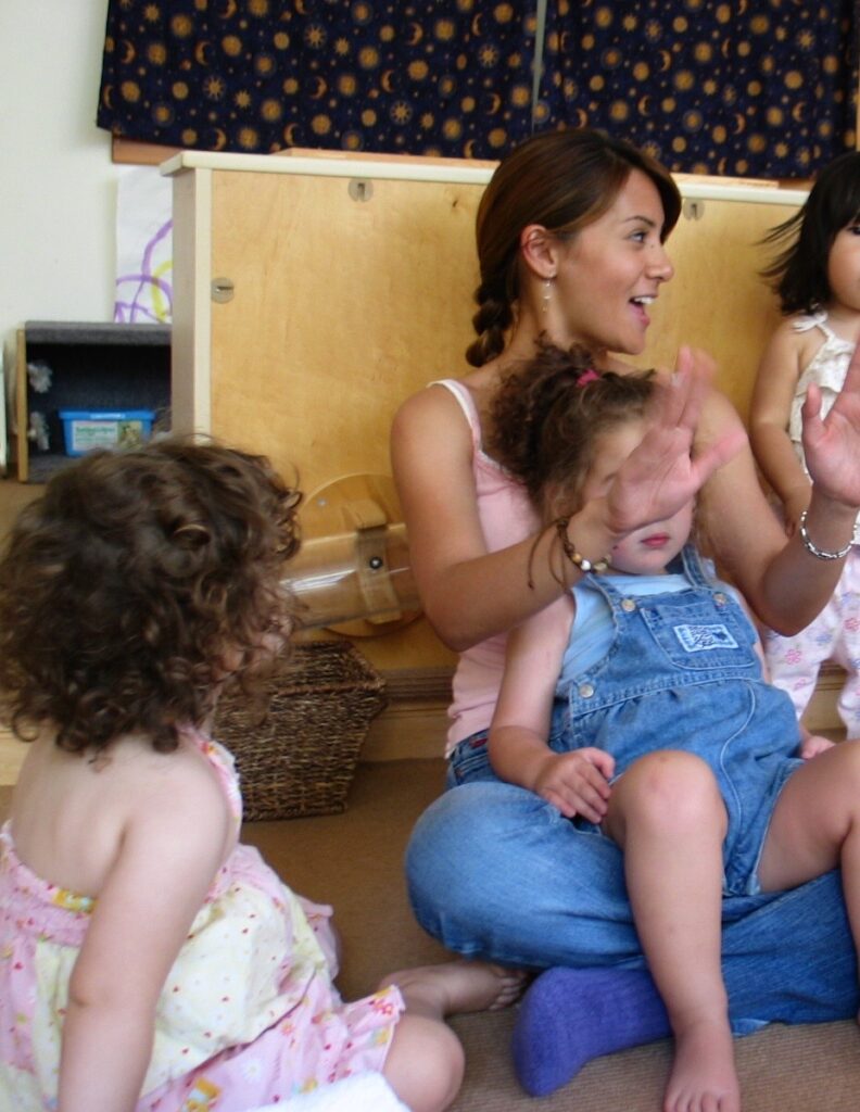 Clarice with kids at early childhood center