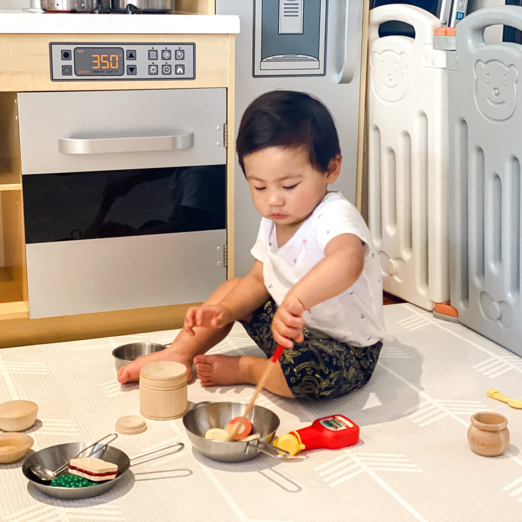 Jonathan with kitchen set and toy food for Autumnlife Reflective Parenting