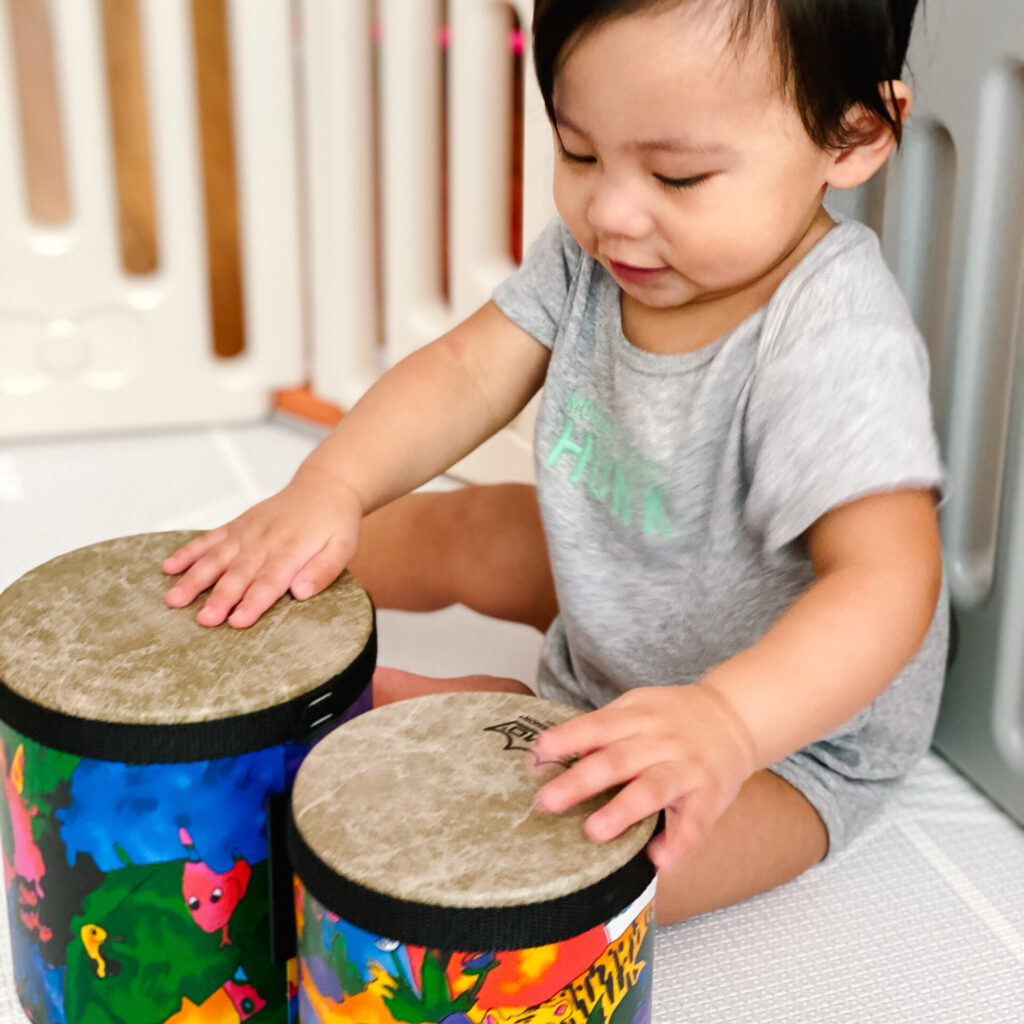 Jonathan with bongo drum. AutumnLife Reflective Parenting.